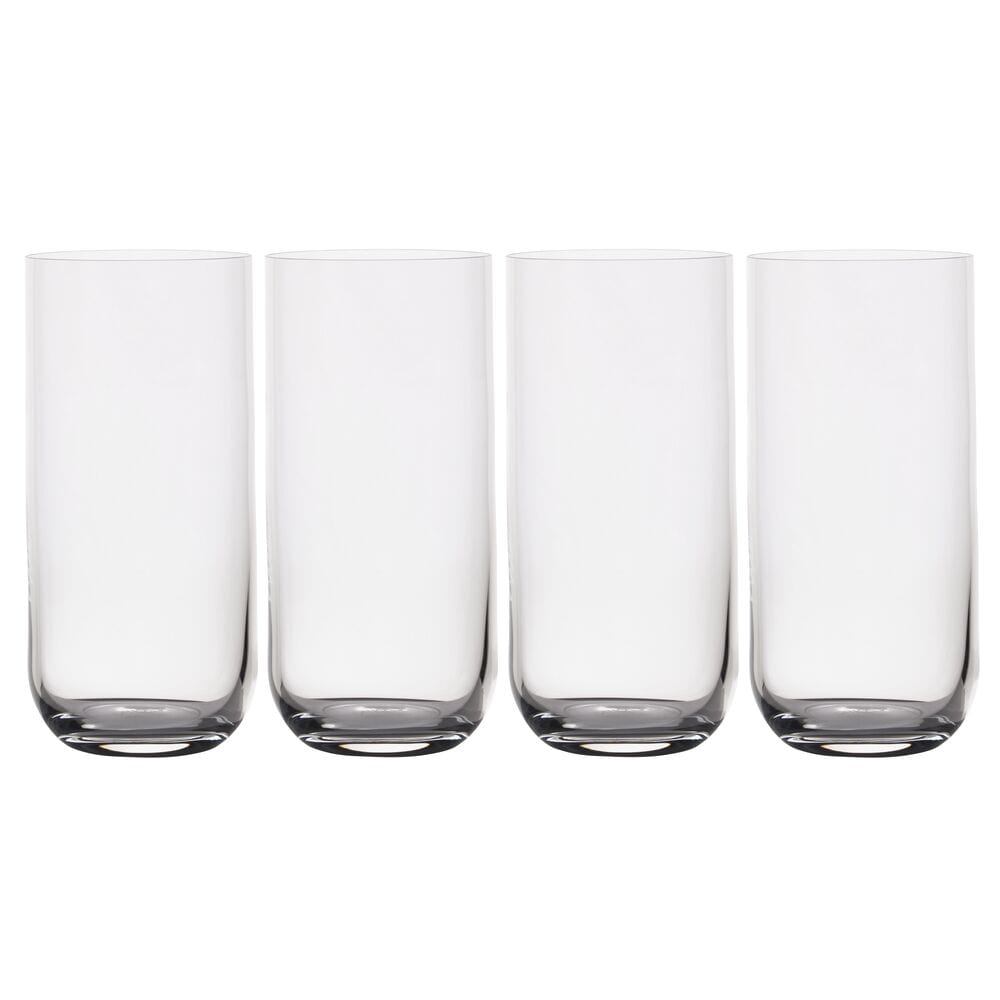 Four empty Upton highball glasses lined up on a white background