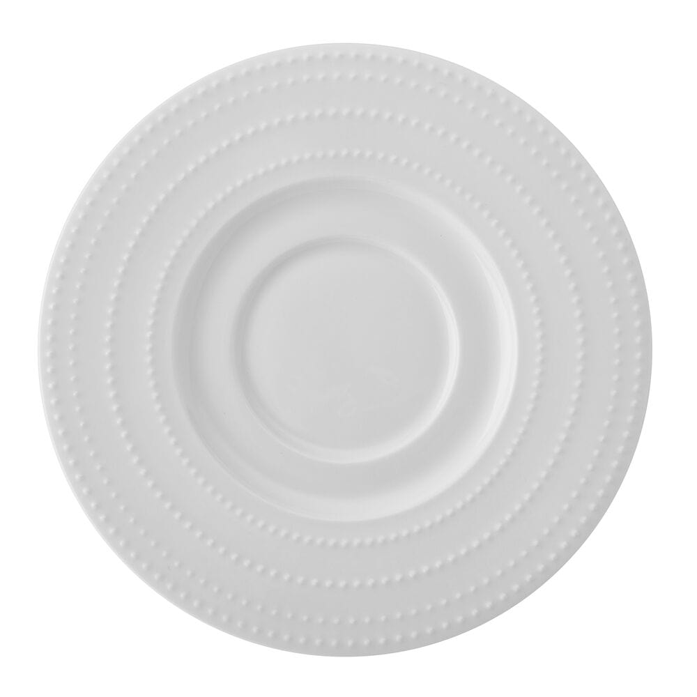 Top view of a white plate with concentric dotted beaded rim design