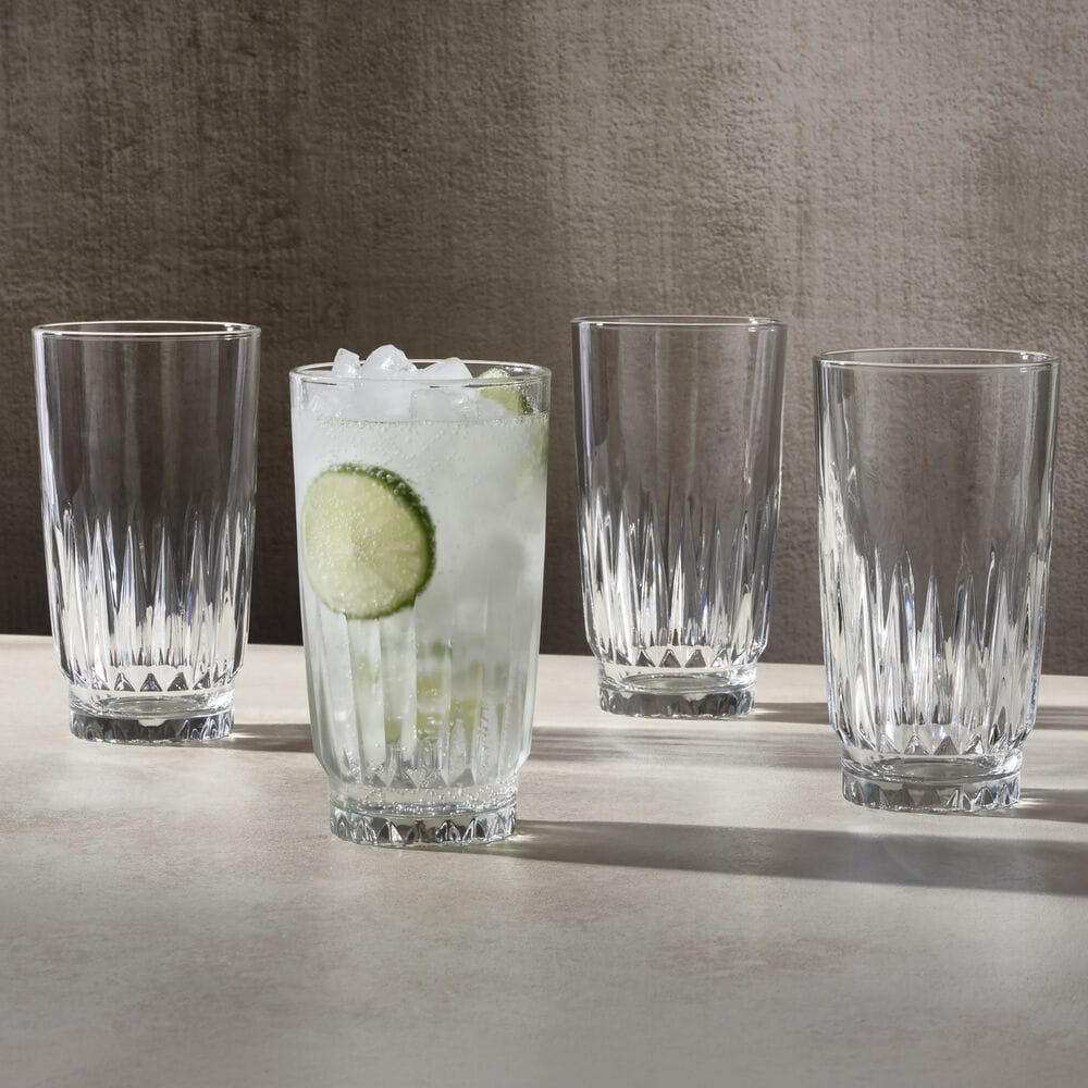 Hampshire set of four highball glasses with one filled with ice and lime