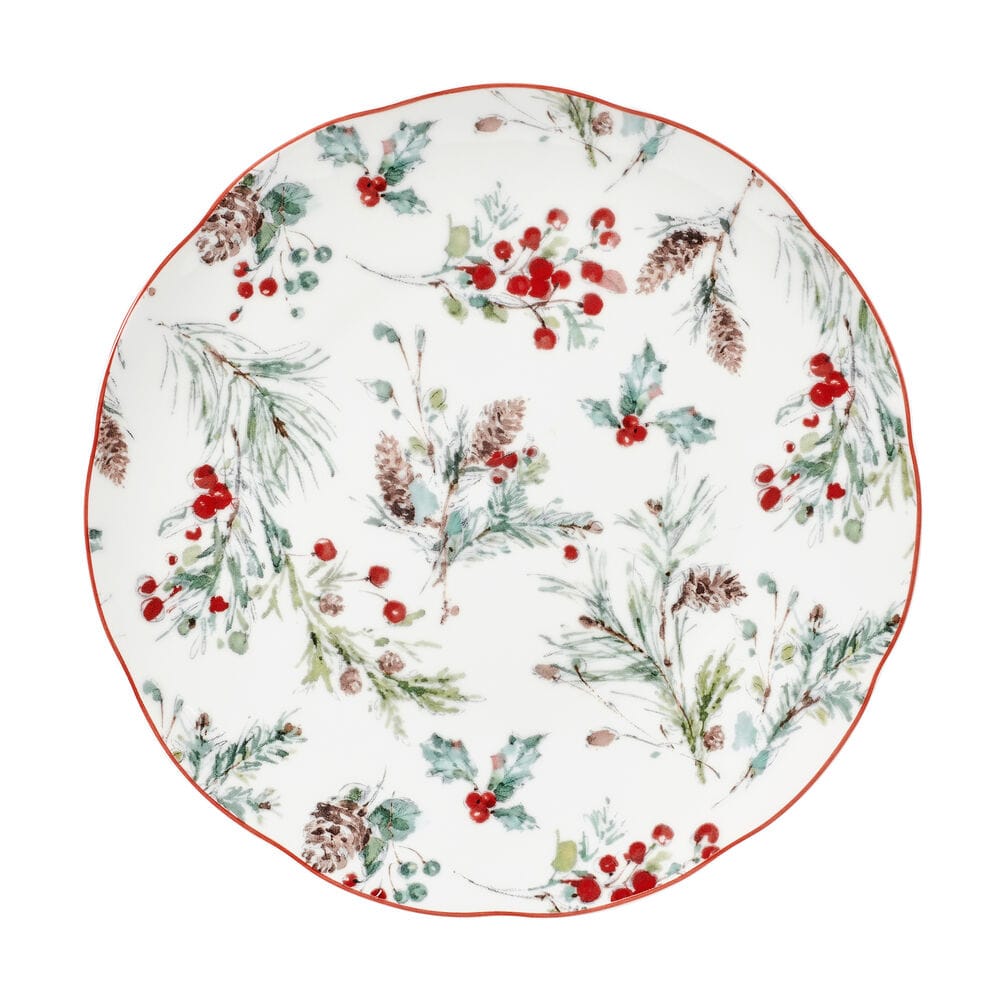 Round dinner plate from Pine and Berry set with scattered holly pine branches and red berries along the rim