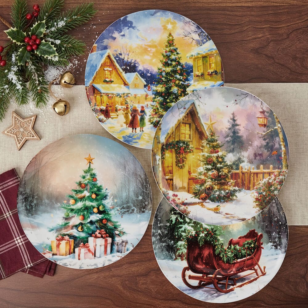 Set of four vintage Christmas salad plates featuring snowy village scenes and a glowing tree motif