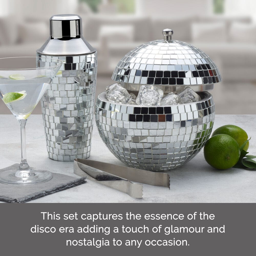 Disco Ball mosaic bar set with ice bucket shaker bar tongs and a martini glass on a bar counter with limes