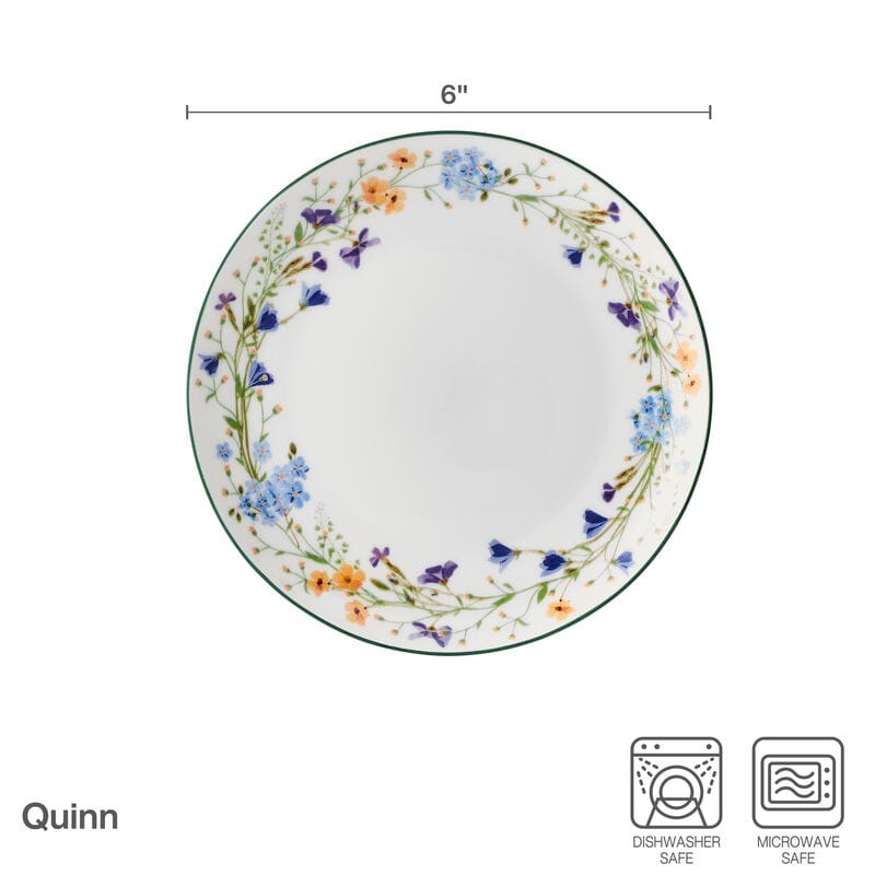 Quinn six inch plate with a vivid floral border of blue orange and purple flowers