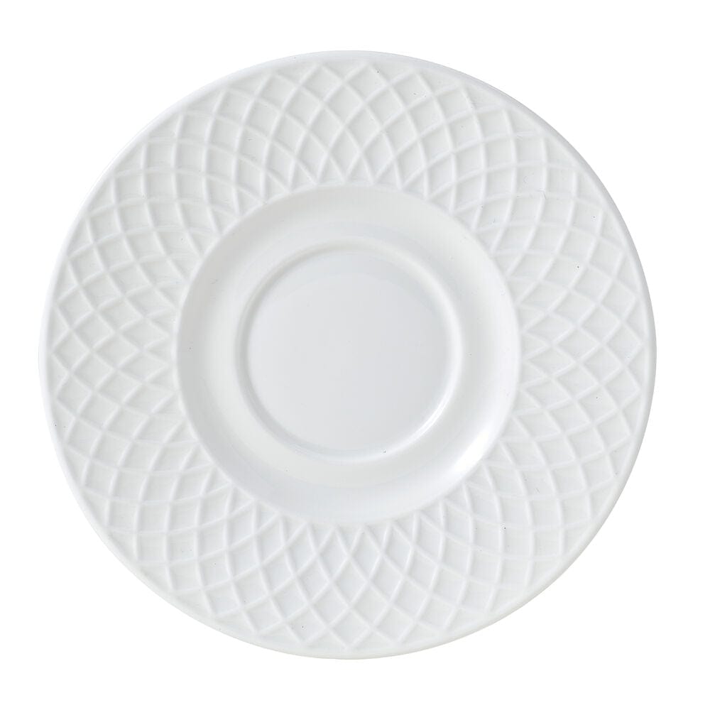 Top view of a white ceramic saucer featuring a diamond lattice pattern and central recess