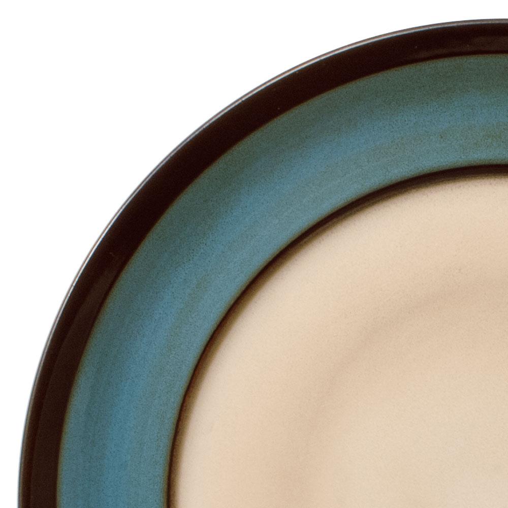 Close-up of Belmont Round Blue Stalks dinner plate with blue green rim and beige center