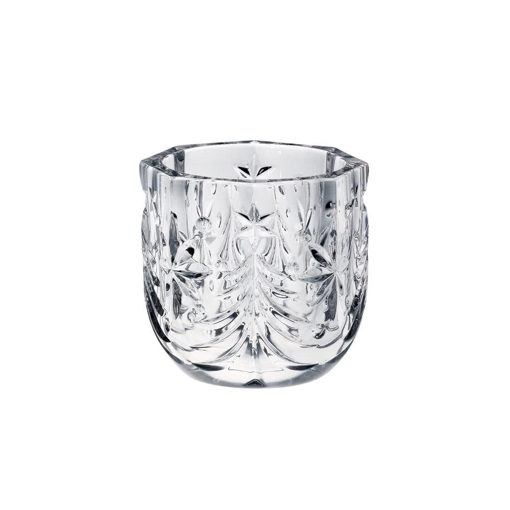 Clear cut glass votive holder with intricate leaf and starburst pattern