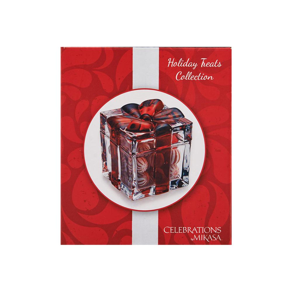 Red holiday treats packaging box with white ribbon design and a circular photo of the glass gift box.