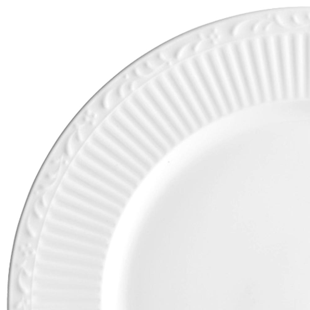 Close-up of the ribbed decorative rim on a white bone china plate