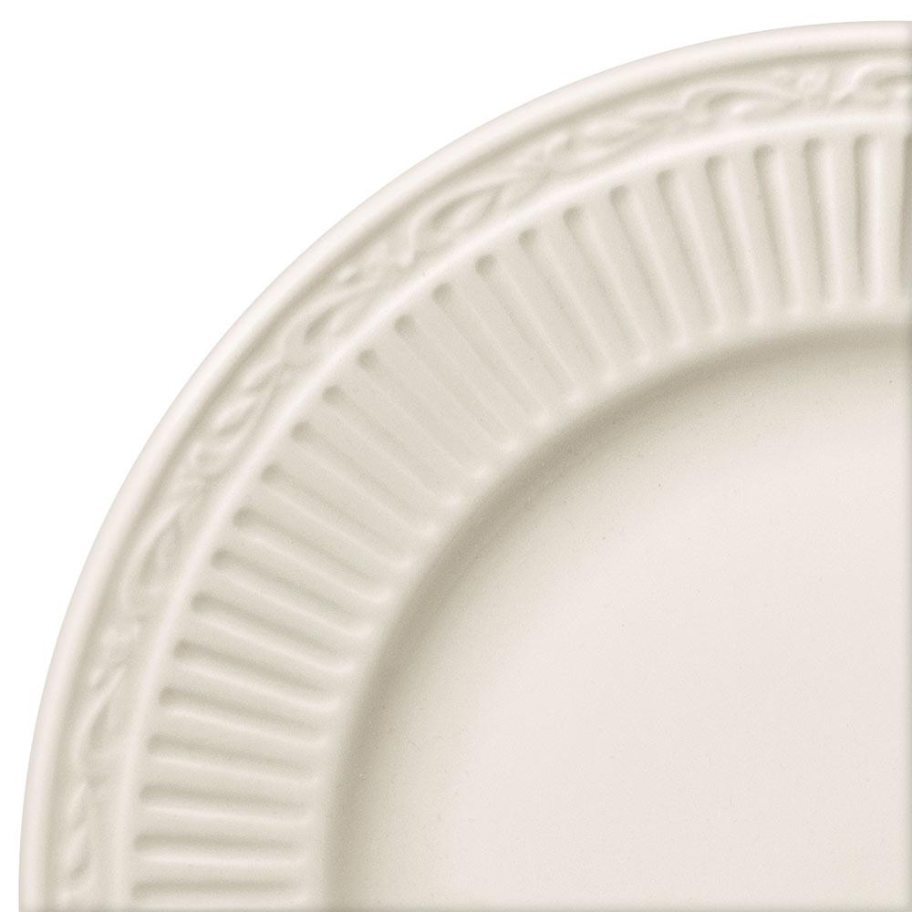 Close up of the embossed ribbed rim on a white Italian Countryside dinner plate