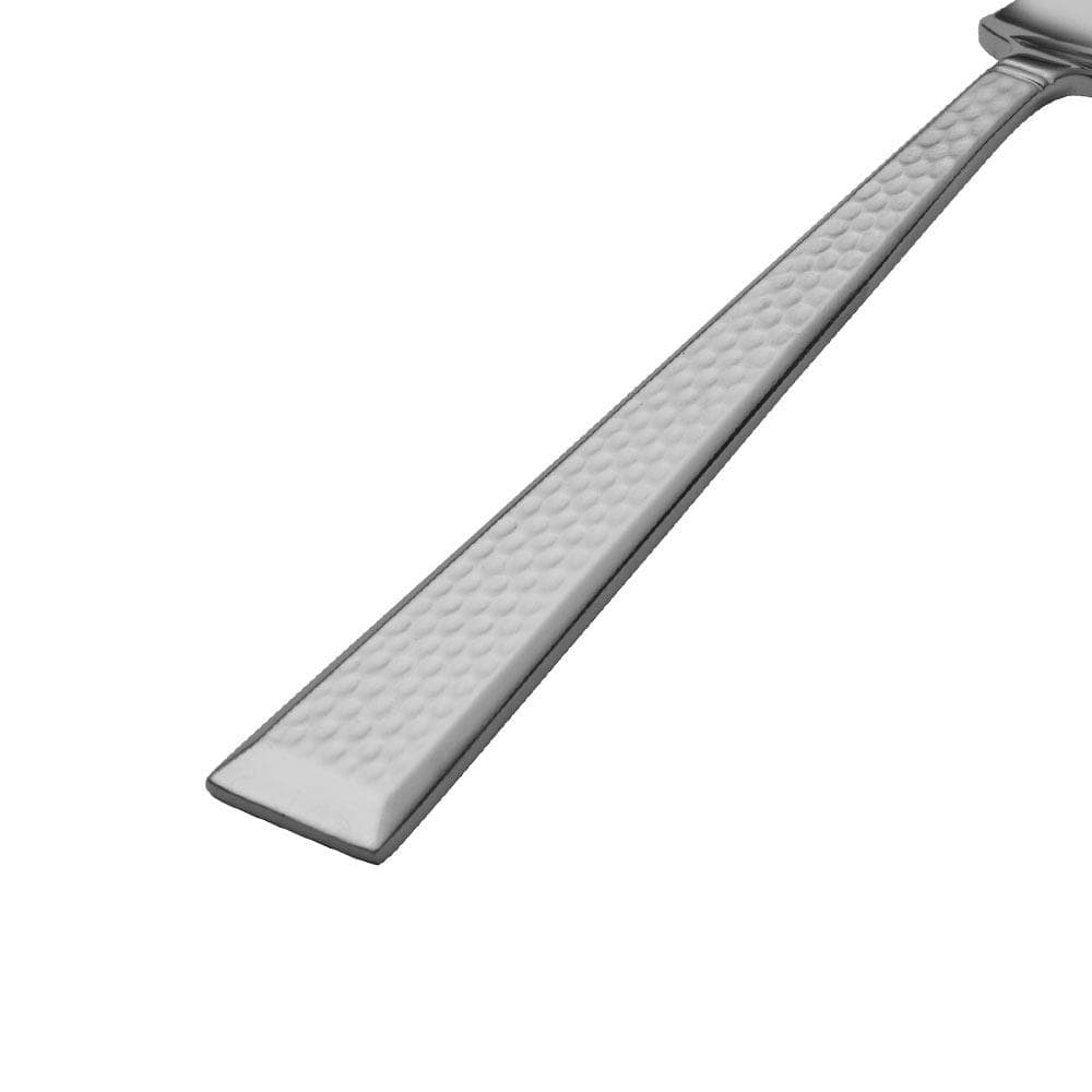 Close up of a hammered stainless steel knife handle from the Kyler flatware set