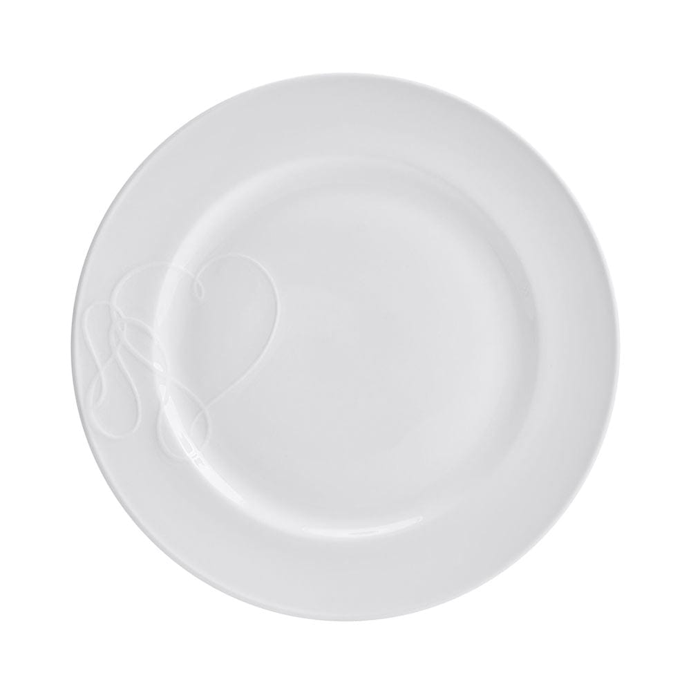 Top view of white Love Story dinner plate highlighting the left side embossed looping design
