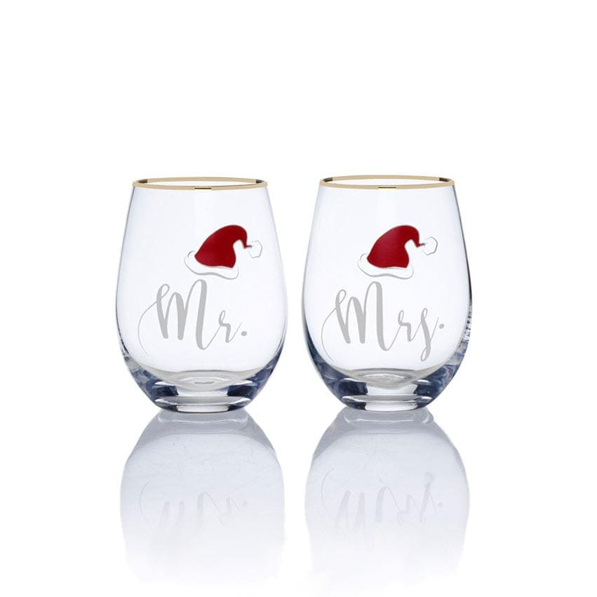 Pair of stemless wine glasses labeled Mr and Mrs with red Santa hats