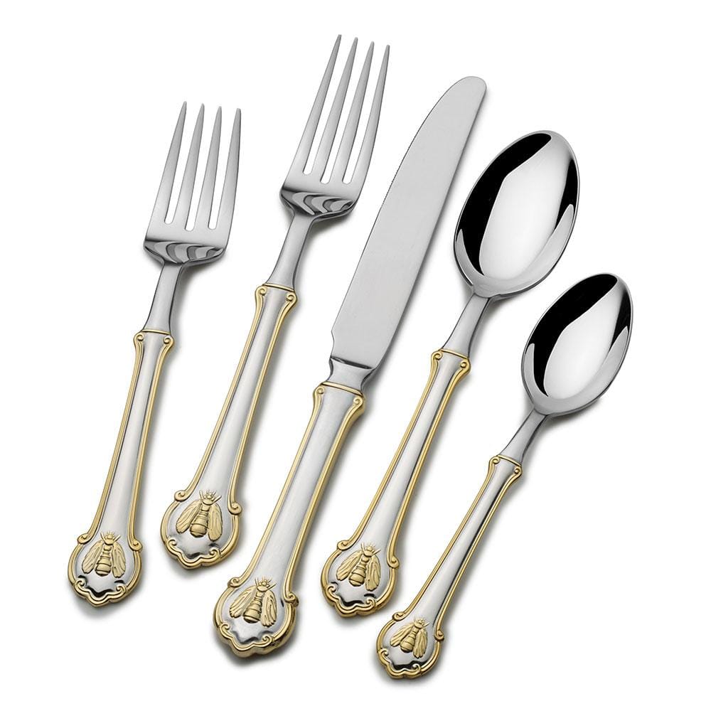 Napoleon Bee gold accented flatware set for eight with ornate bee motifs on silver handles.