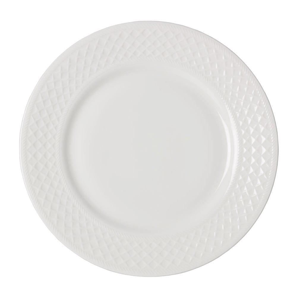 Top-down view of a Patterson Vegan Bone 12 piece dinner plate with a textured diamond rim.