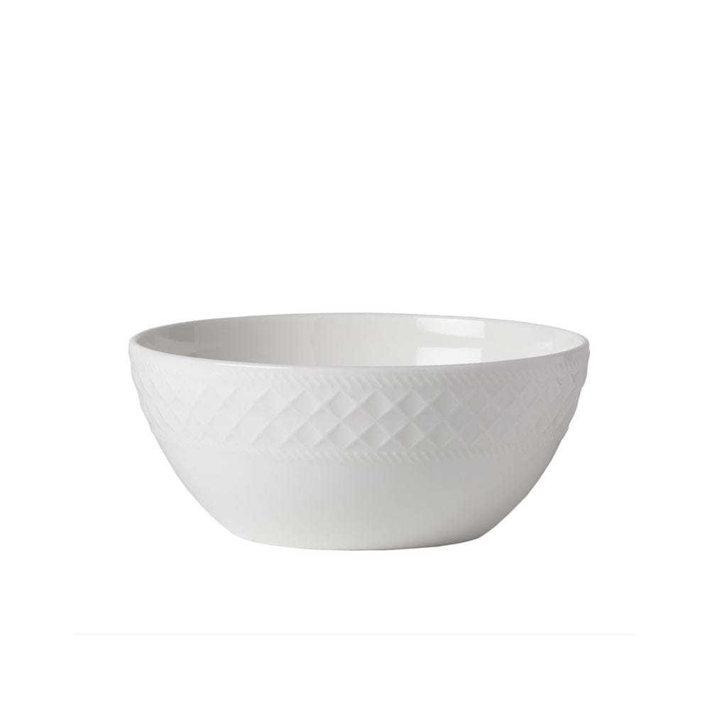 White textured bowl with a diamond pattern around the upper exterior from Patterson Vegan Bone dinnerware.