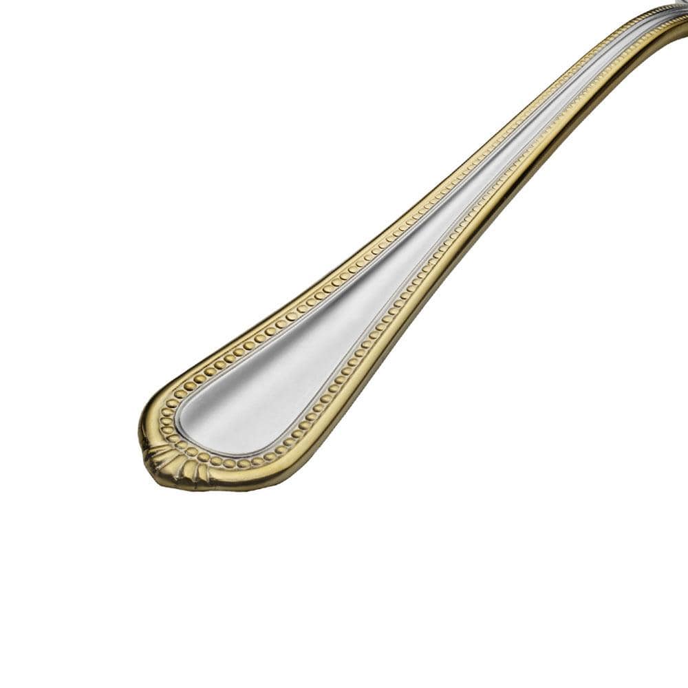 Close-up of Regent Bead Gold flatware handle with beaded gold edging