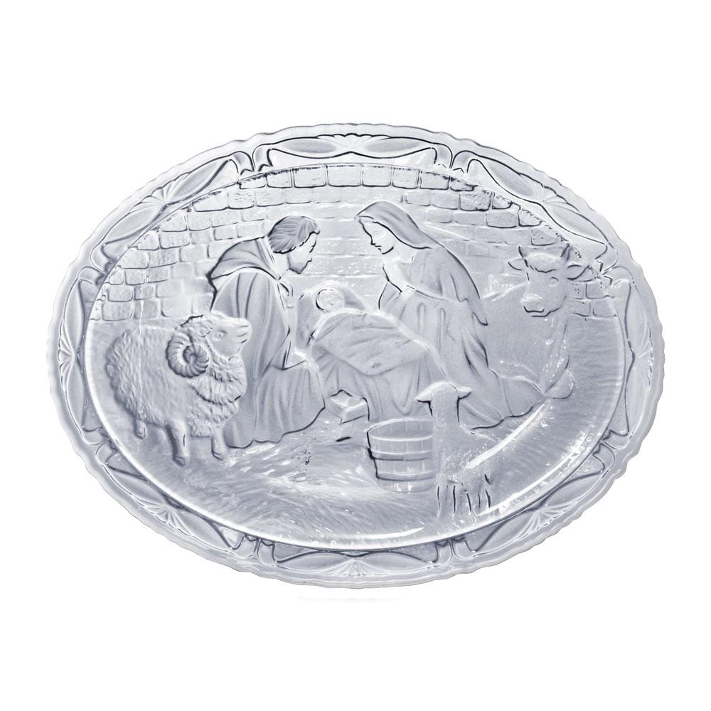 Oval clear crystal nativity plate with stand showing the holy family in relief.