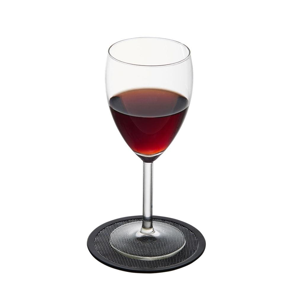 Wine glass resting on a round black coaster from the set of 8 drink covers and coasters