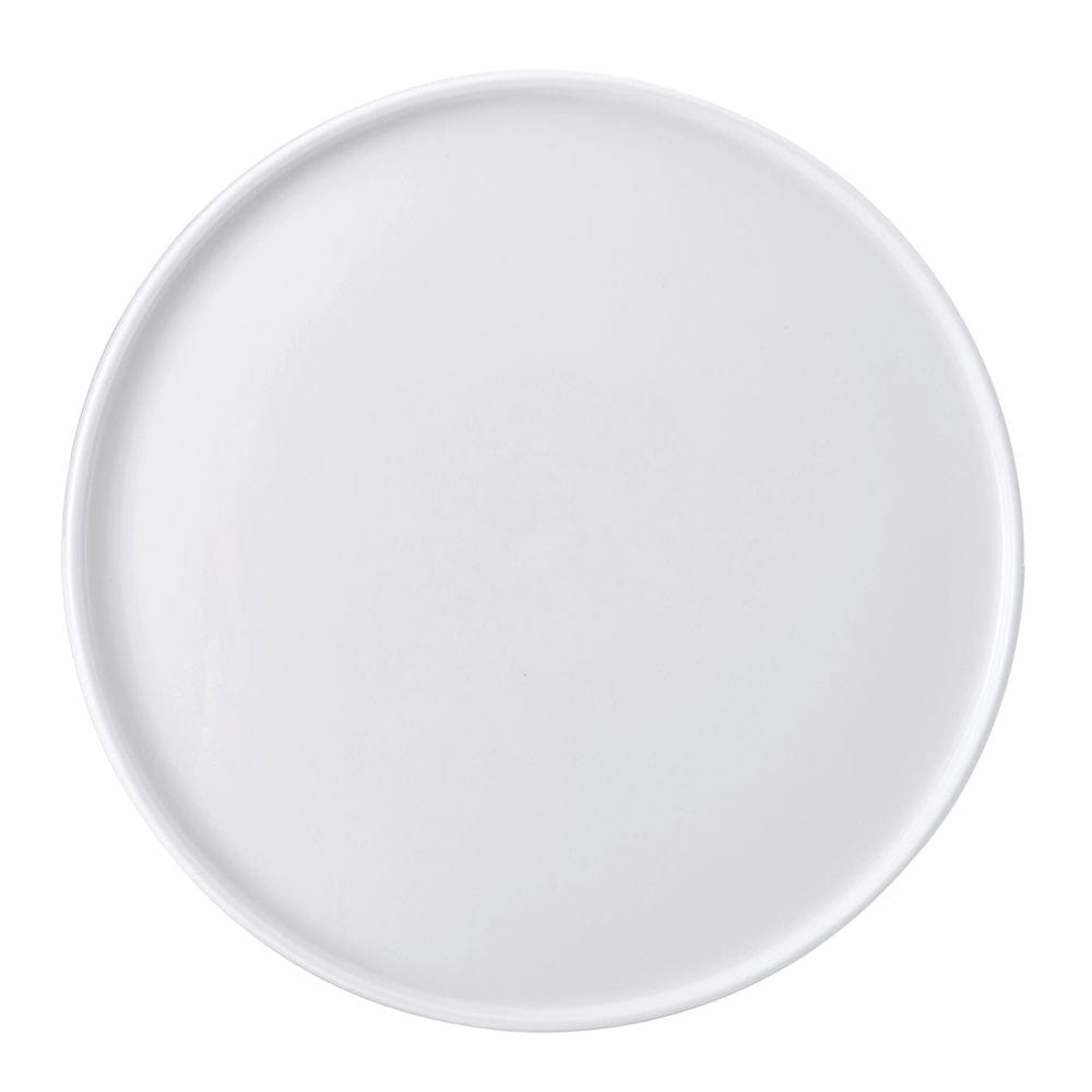 Top-down view of a white round dinner plate