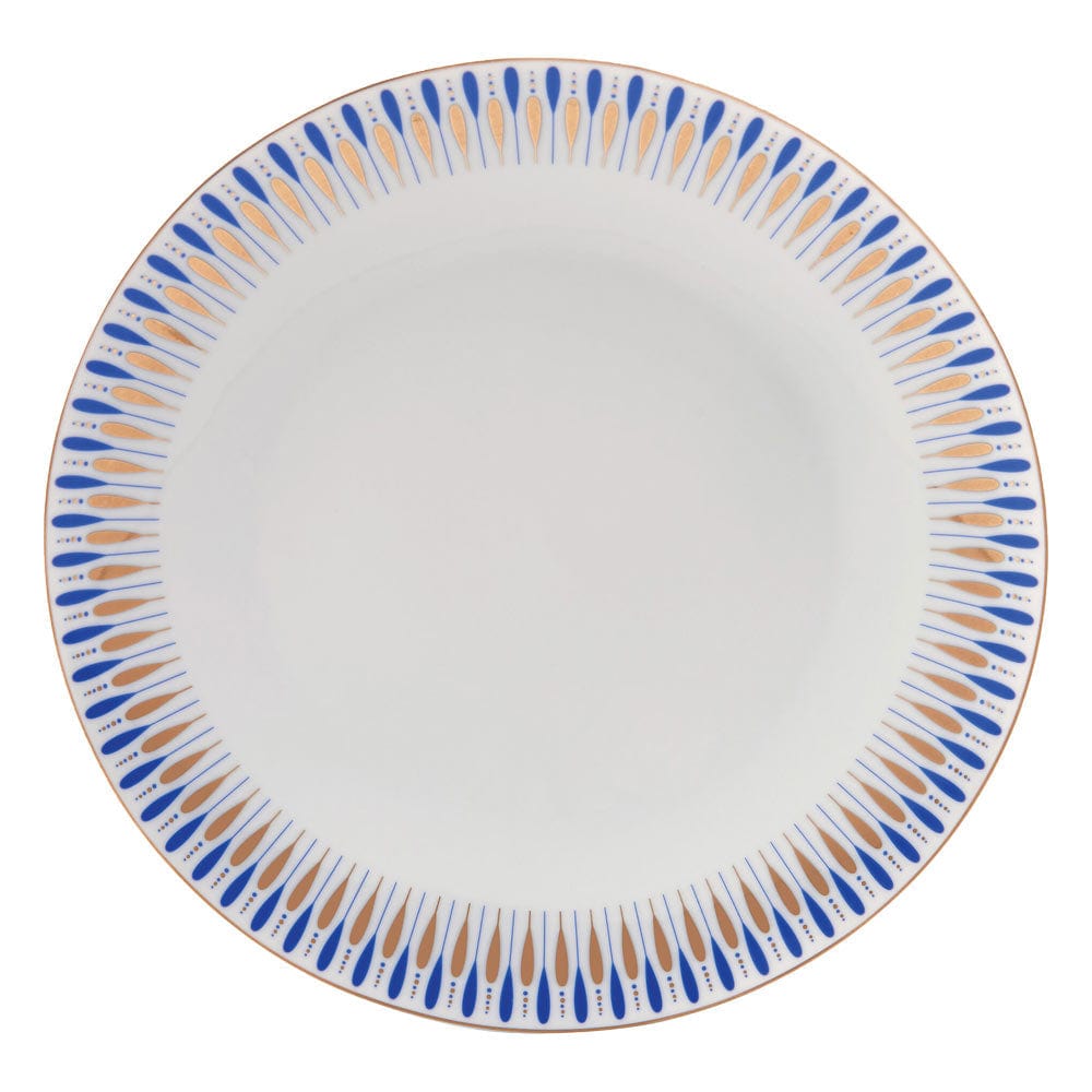 Top-down view of a Starburst Blue dinner plate with a blue and gold patterned rim