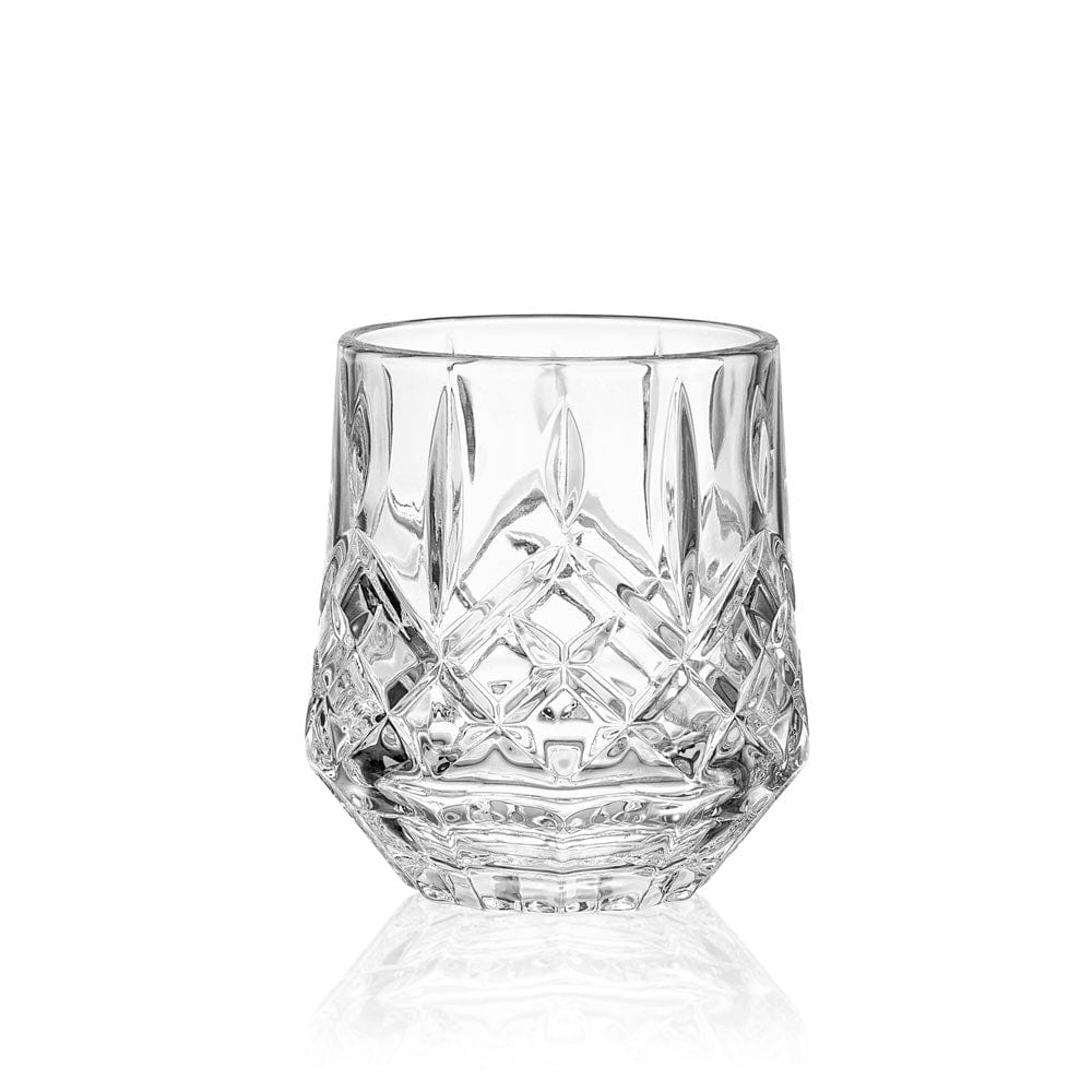 Close up of a faceted crystal whiskey glass with a diamond pattern