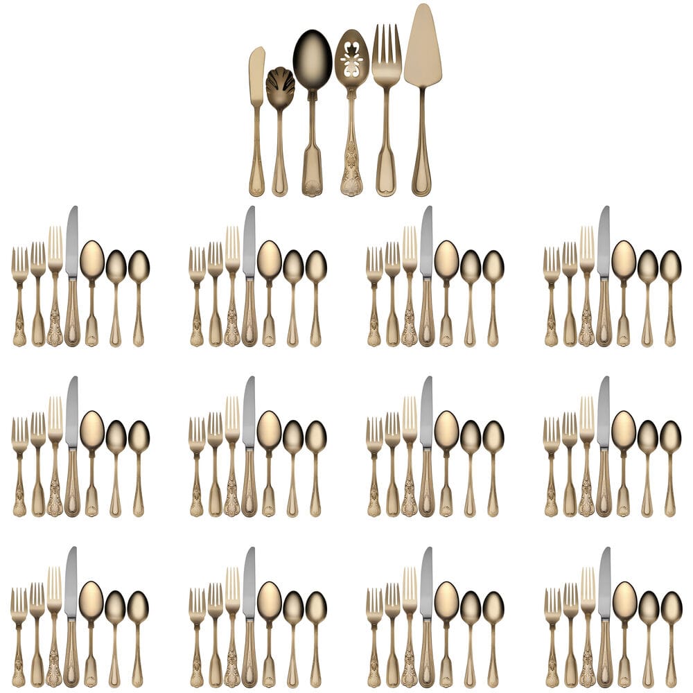 Gold plated flatware set arranged for twelve place settings