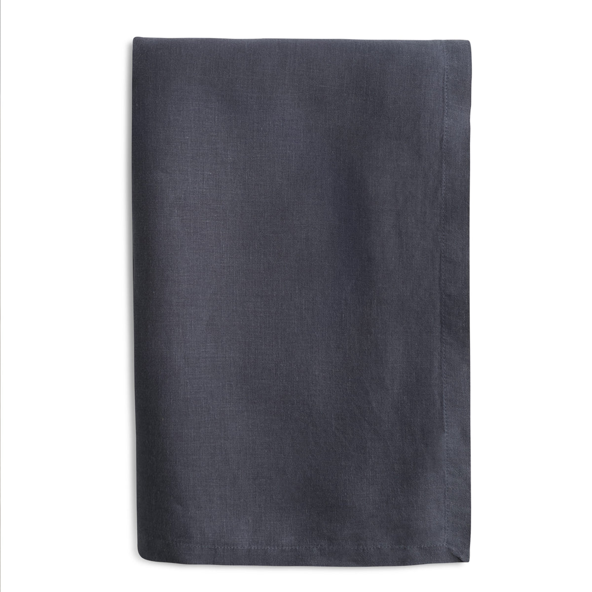 Folded midnight blue European linen napkin on a white background.
