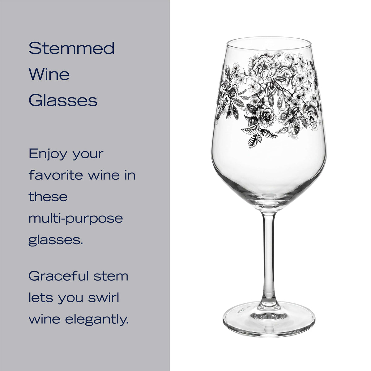 Pair of clear stemmed wine glasses with vertical flute patterns against a gray panel