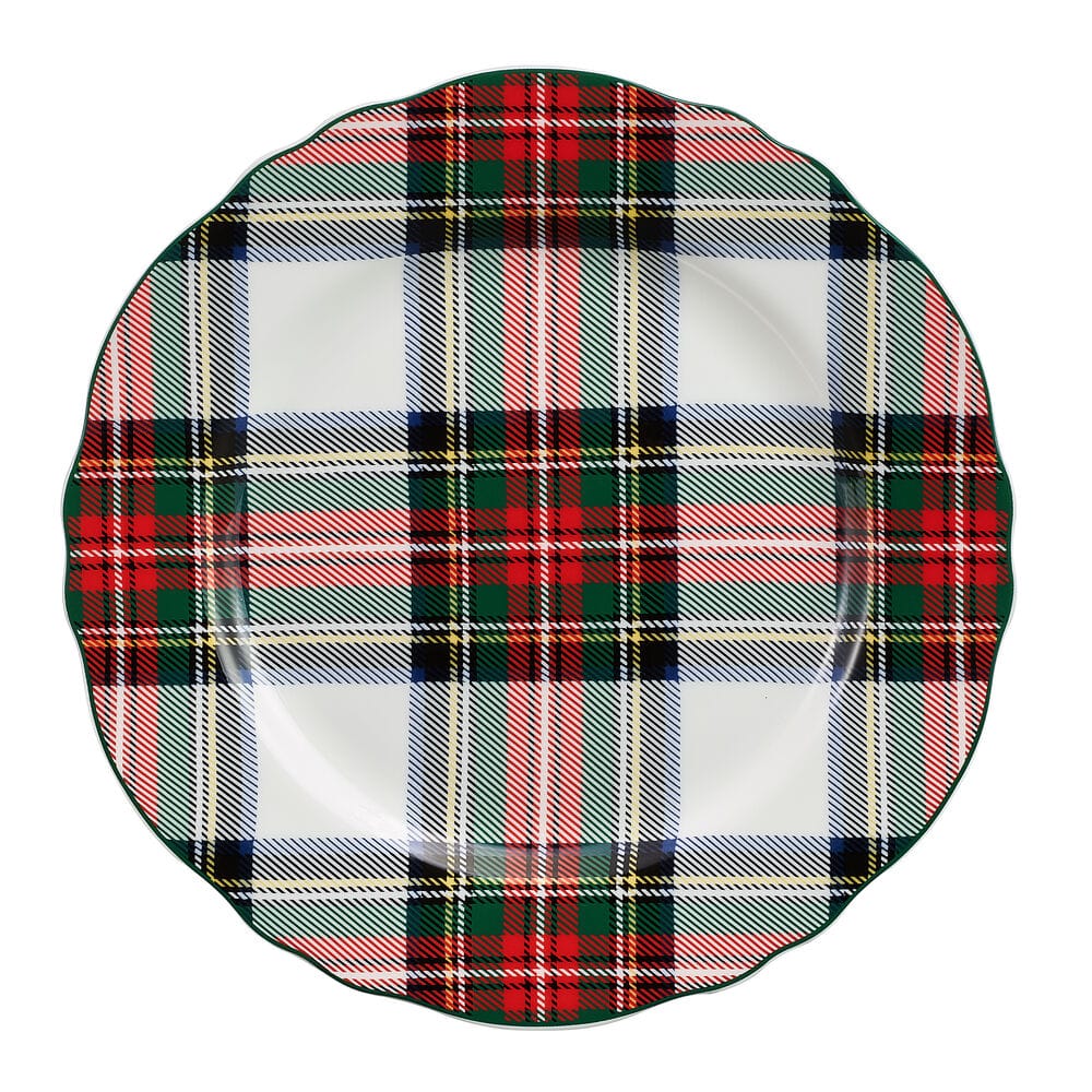 Plaid tartan border around a scalloped edge plate with white center viewed from above.