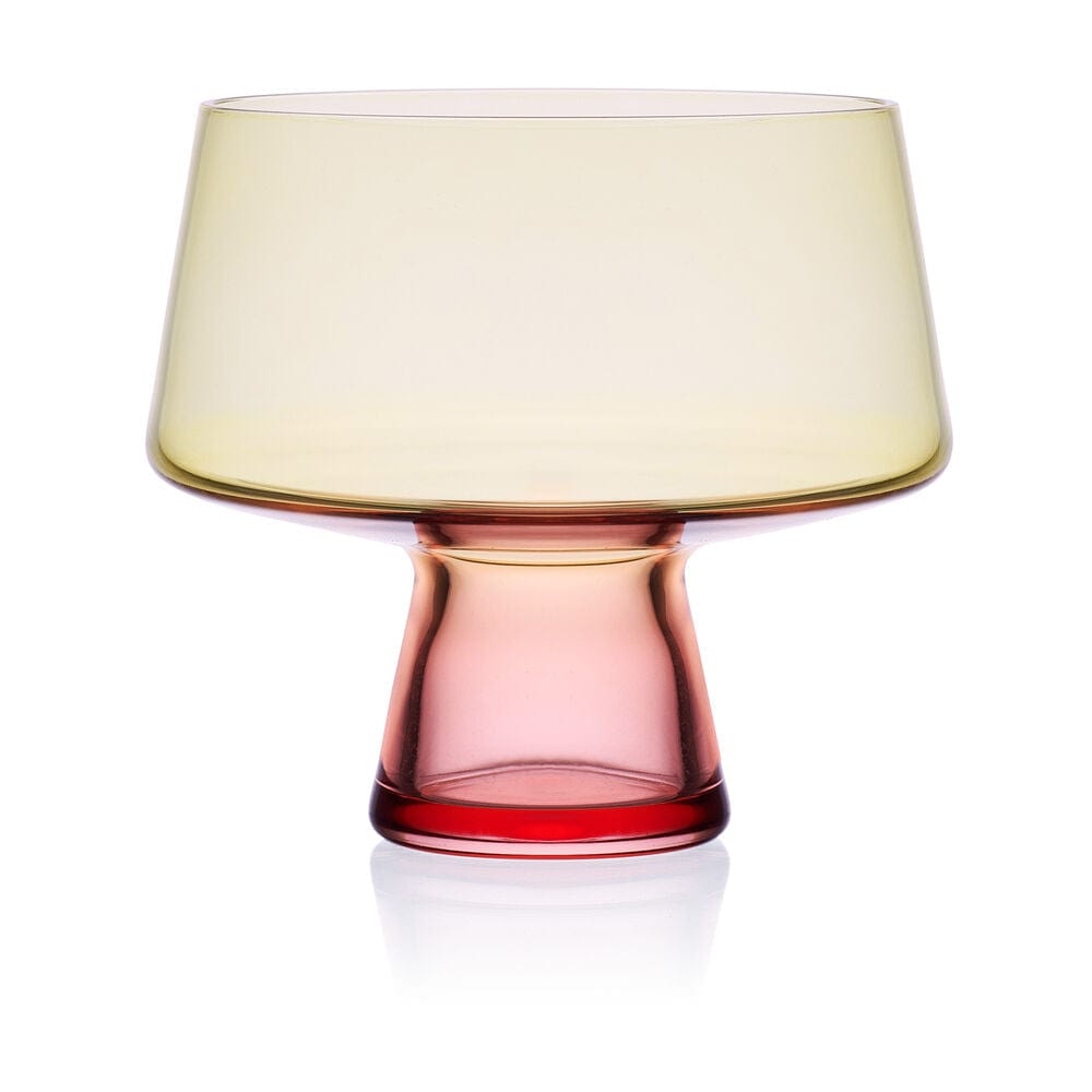Yellow tinted glass with a rounded bowl and pink pedestal stem accented by a red ring