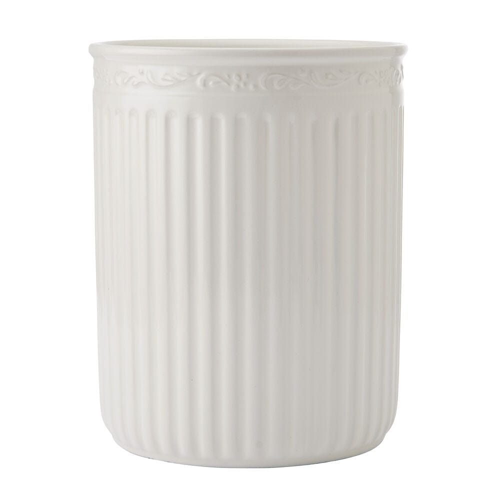 White ribbed ceramic utensil crock with an embossed decorative band near the rim.