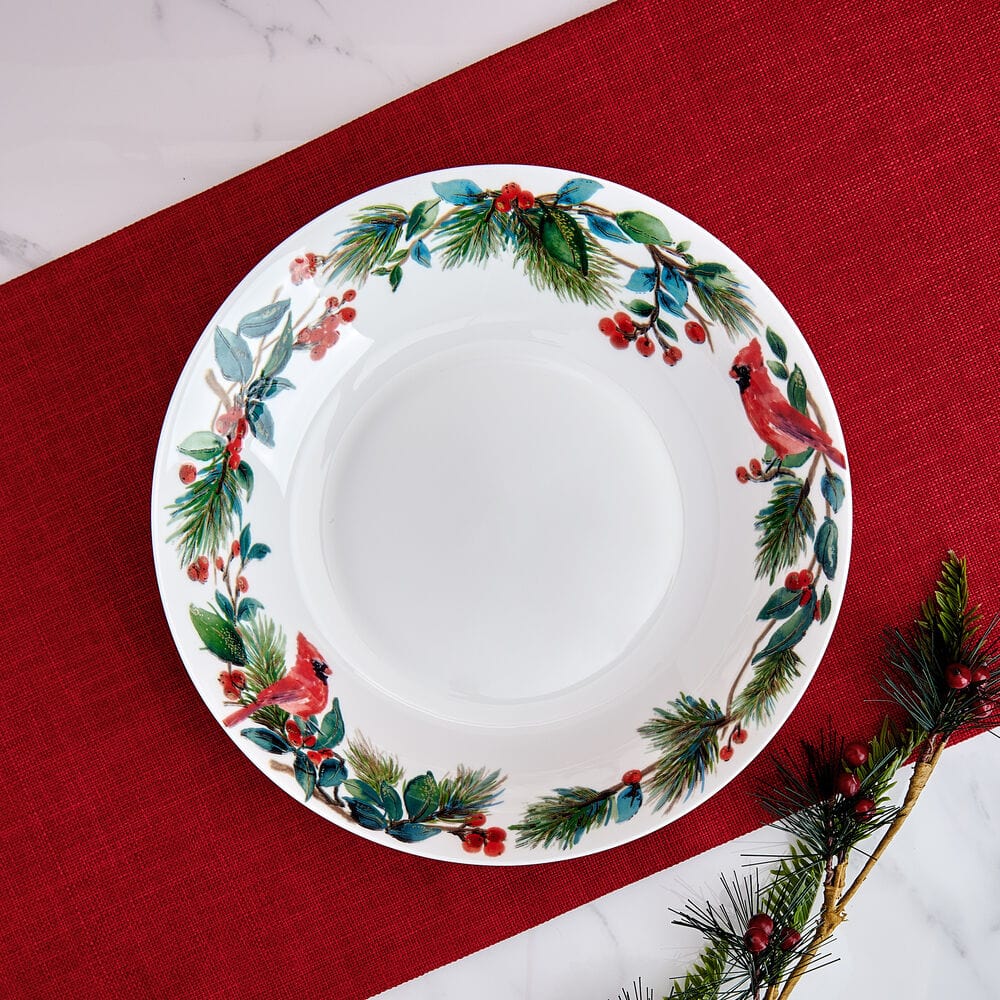 Winter Cardinal Serve Bowl with cardinals and pine border along the rim on white porcelain.