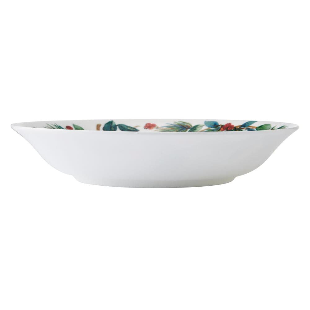 Side profile of Winter Cardinal Serve Bowl showing the curved form and cardinals and greenery along the rim.