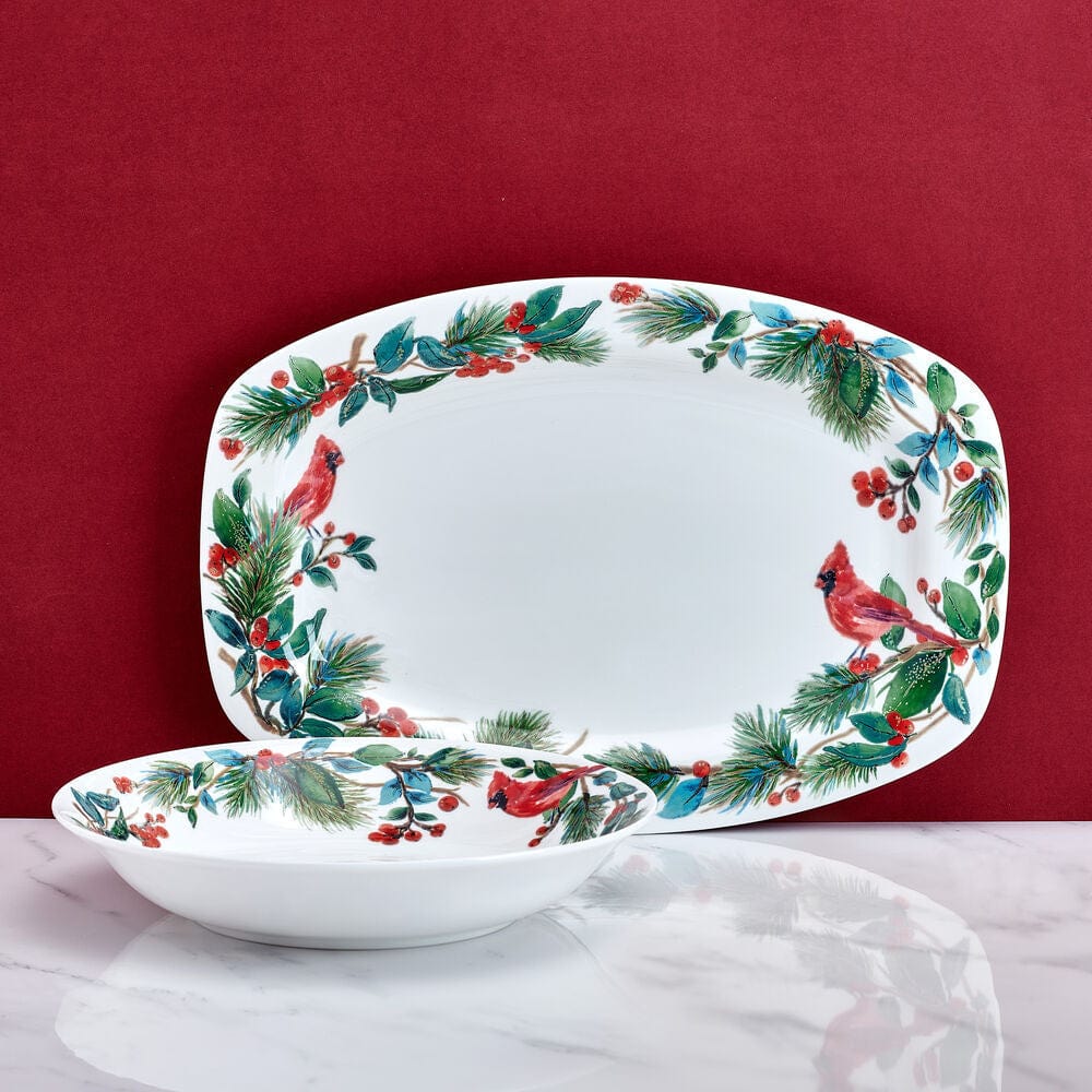 Winter Cardinal serve bowl with festive greenery and red cardinal motif on white porcelain