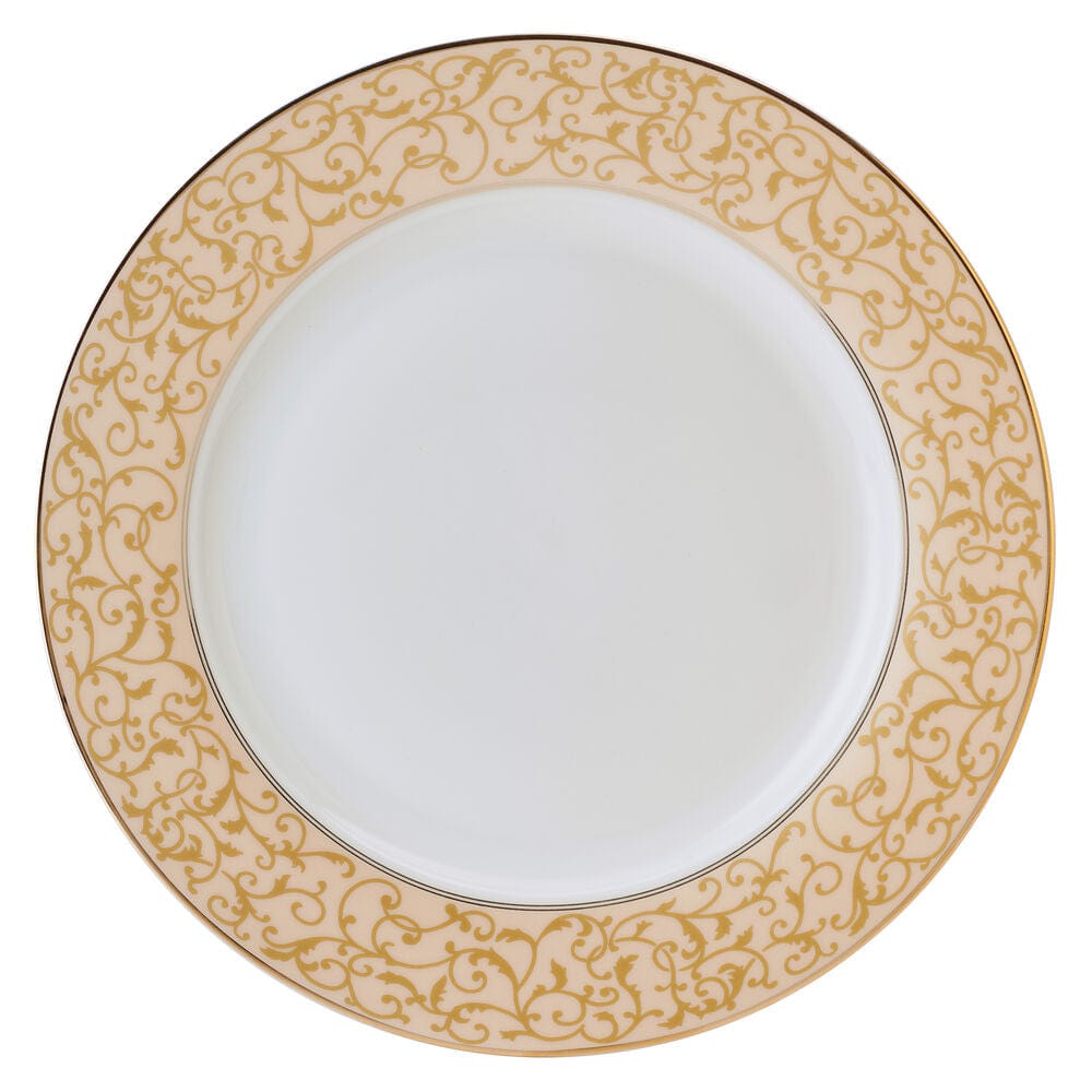 Top-down view of a large dinner plate with an ornate parchment gold rim.