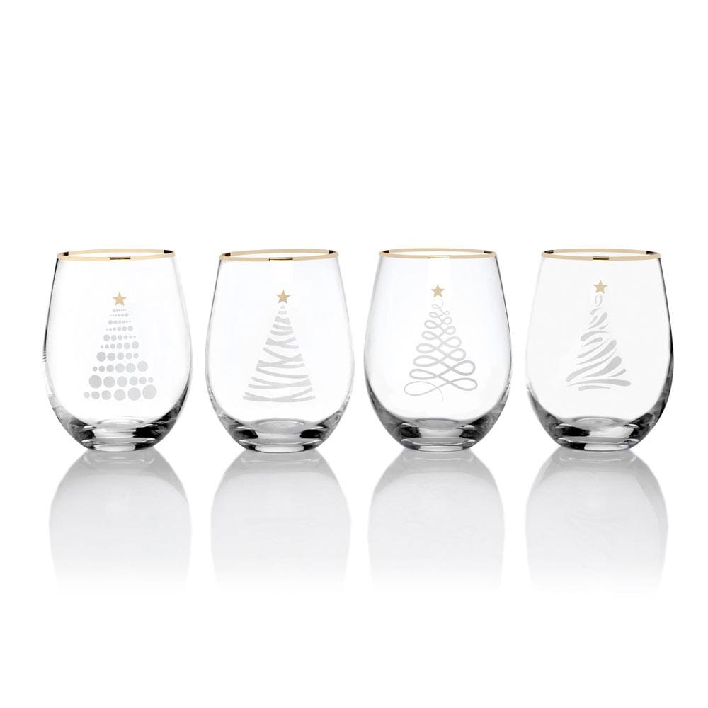 Set of four stemless wine glasses with gold rims and silver Christmas tree designs