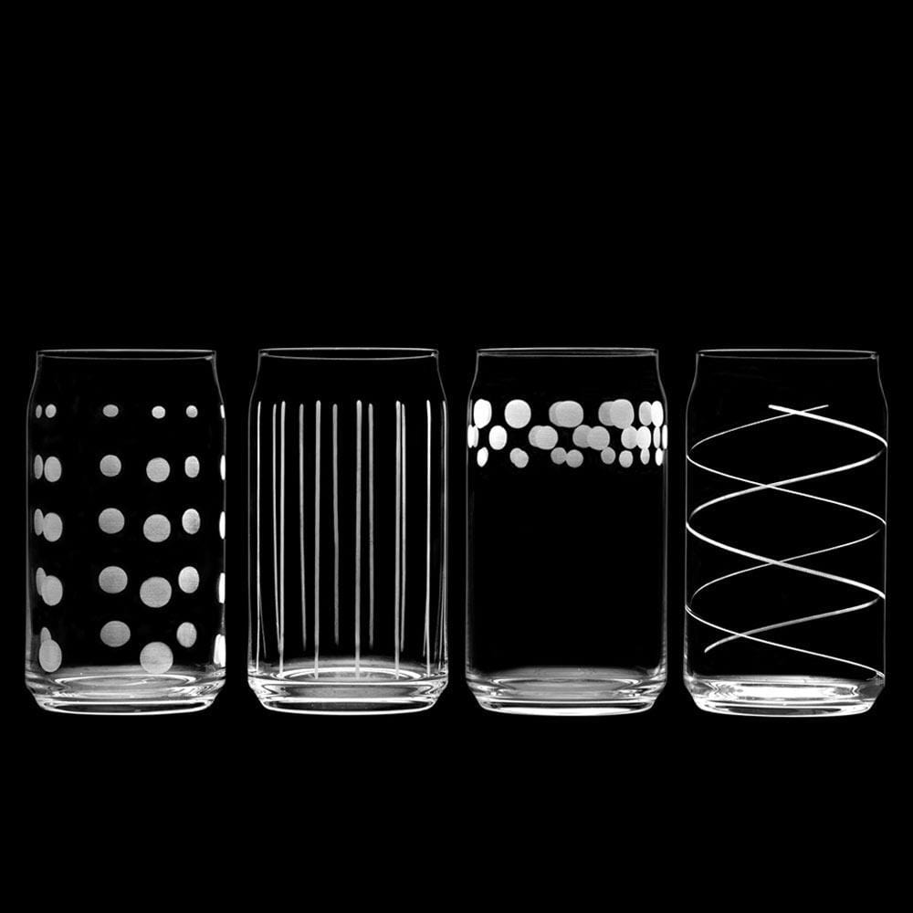 Set of four clear Cheers seltzer glasses on a black background displaying four patterns polka dots vertical stripes clustered dots and diagonal spiral lines.