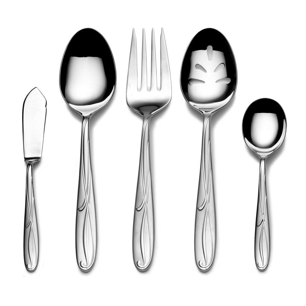 Cocoa Blossom flatware pieces in a row knife large spoon fork spoon teaspoon