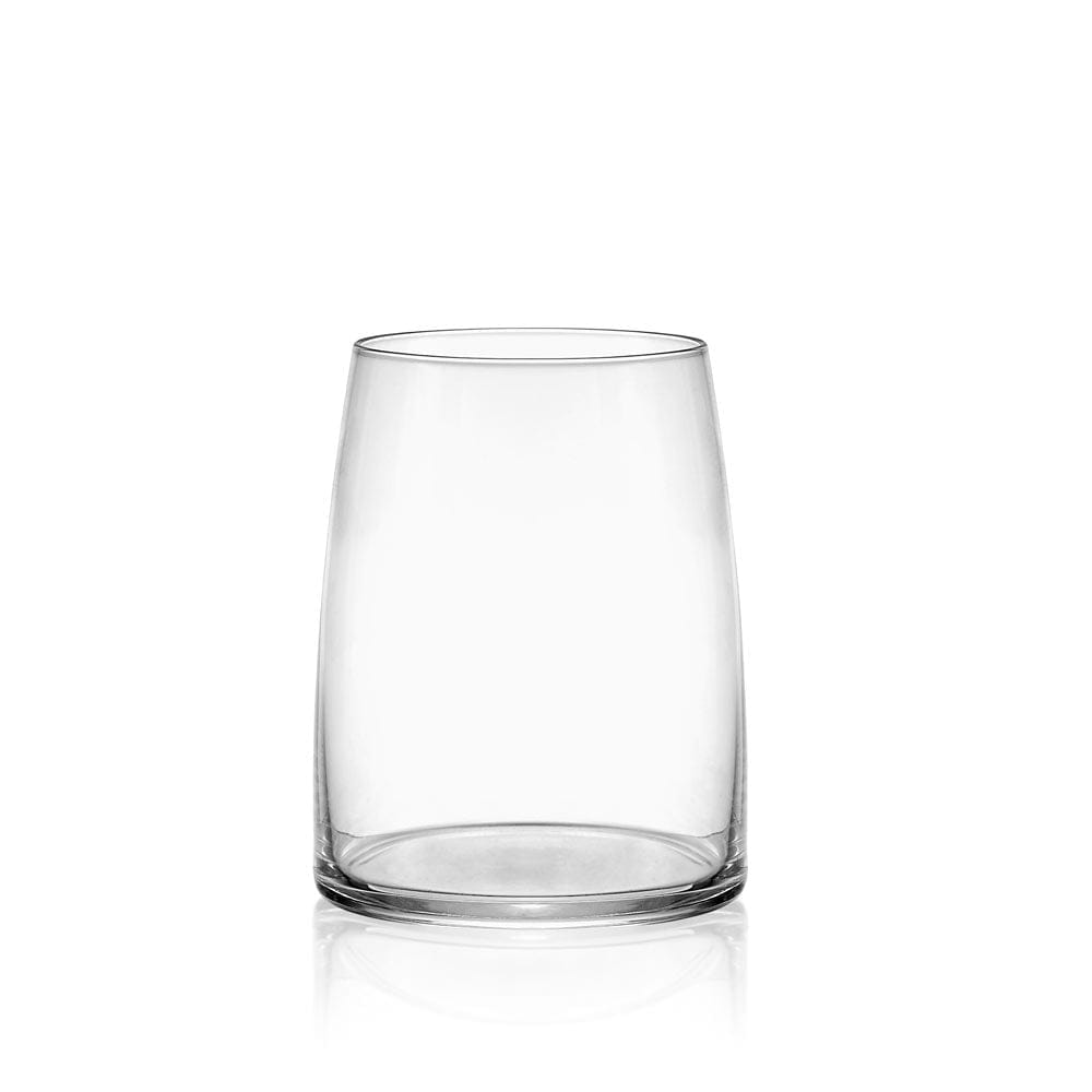 Clear double old fashioned whiskey glass on a white studio background