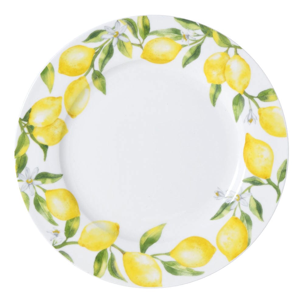 Dinner plate with lemon motif around the rim featuring yellow lemons and green leaves on white