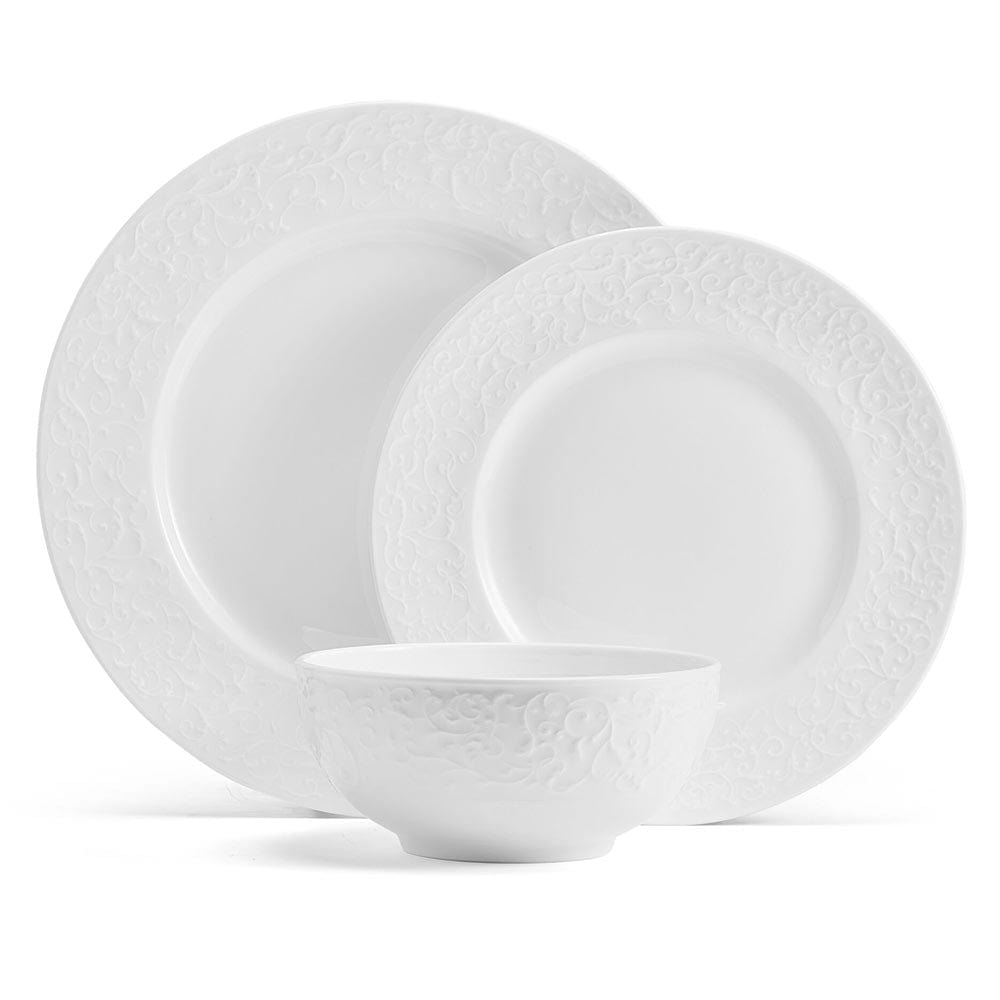 Parchment white embossed dinnerware set with ornate rim plates and a matching bowl