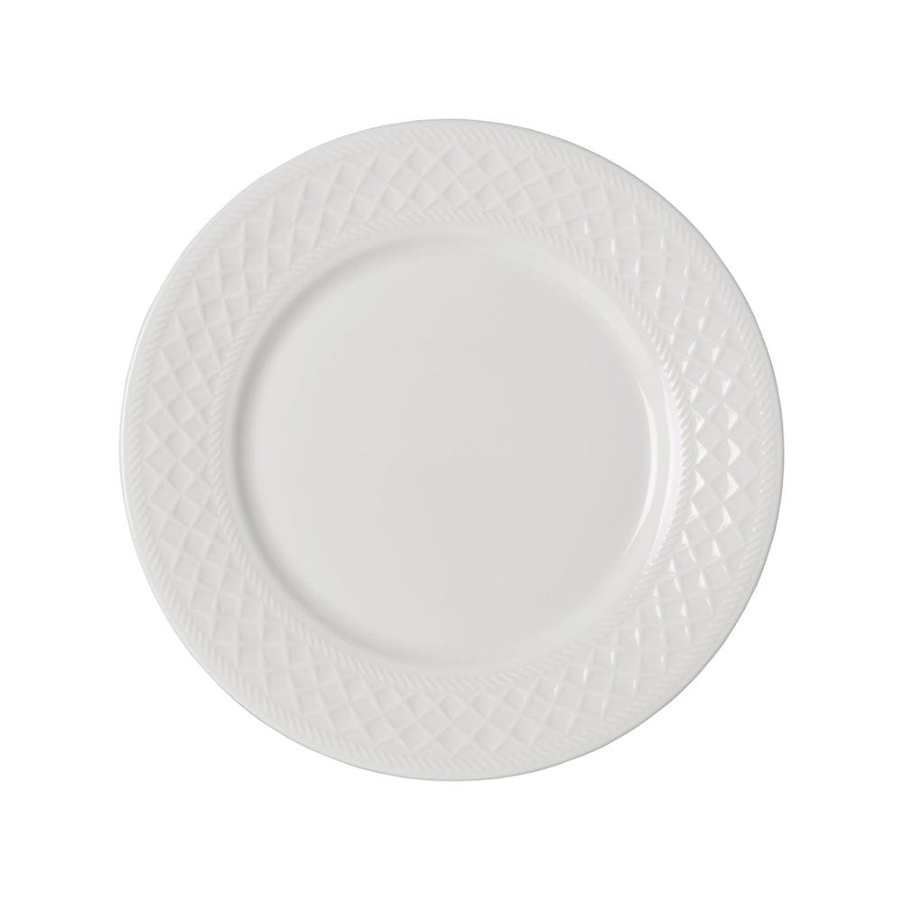 Overhead shot of a Patterson Vegan Bone plate with a smooth center and diamond patterned rim.
