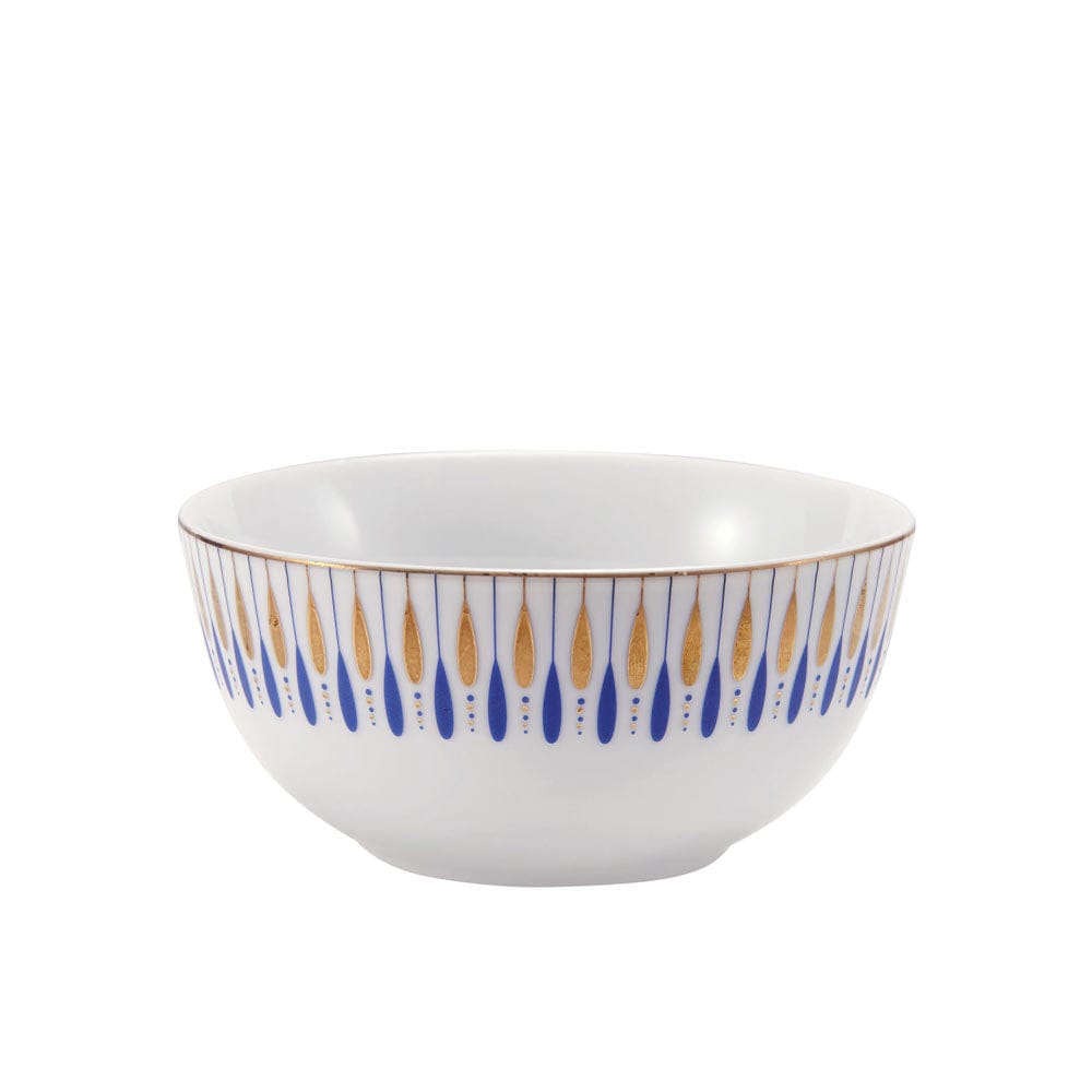 Side view of Starburst Blue bowl with blue and gold teardrop border along the rim
